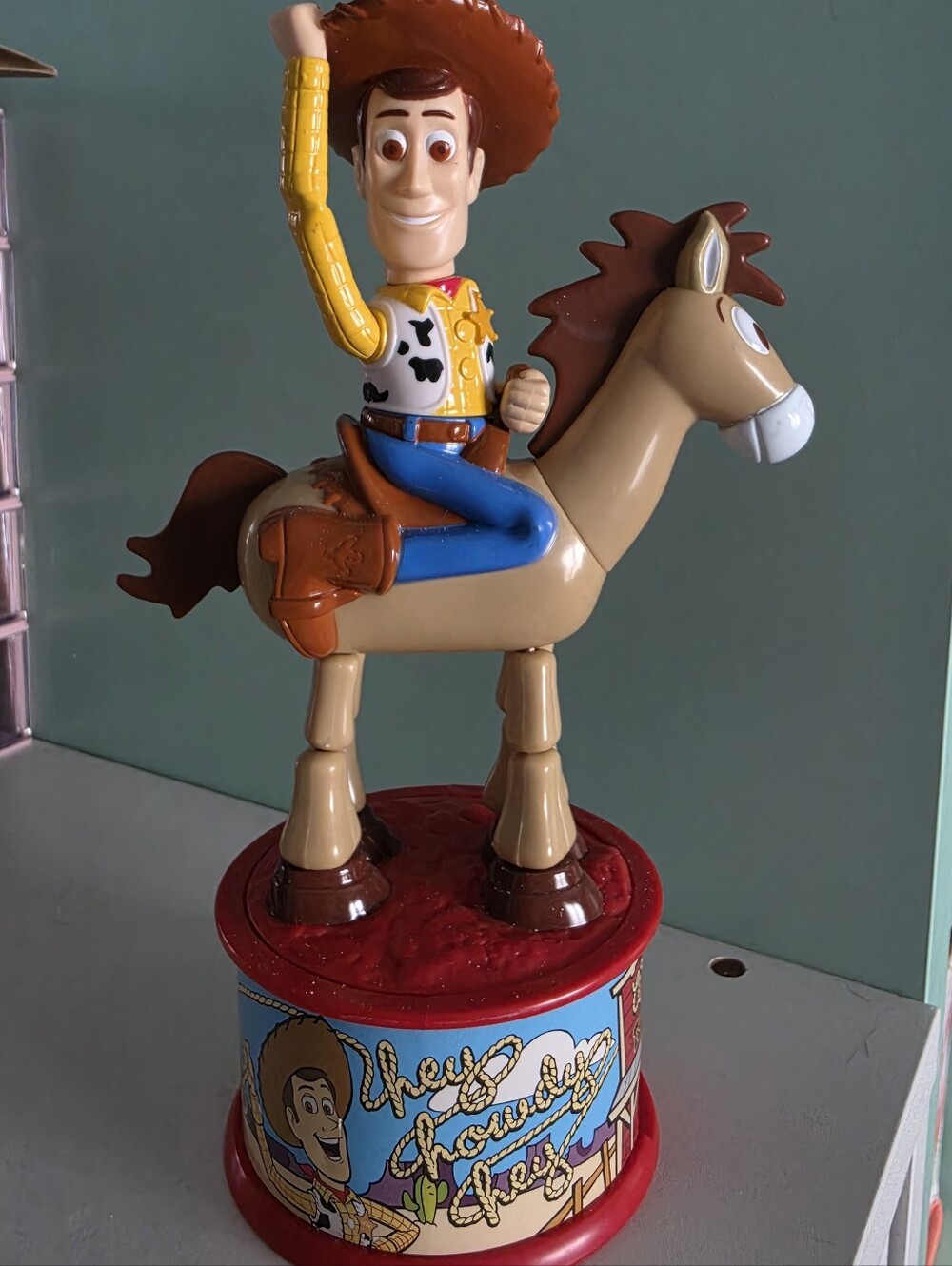 Woody Toy Story on horse bank candy dispenser thing